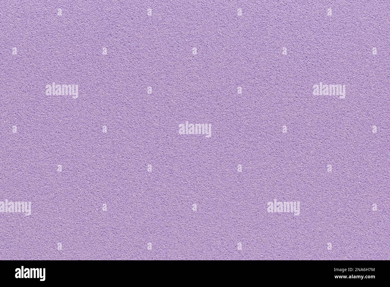 Purple lavender solid background color. Porous textured blank surface with copy space. Stock Photo