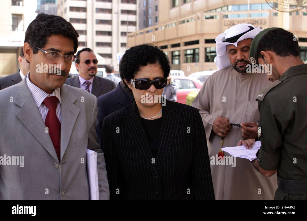 Bahraini Dr. Nabeel Tammam, left, Dr. Ali al-Ekri, second left 