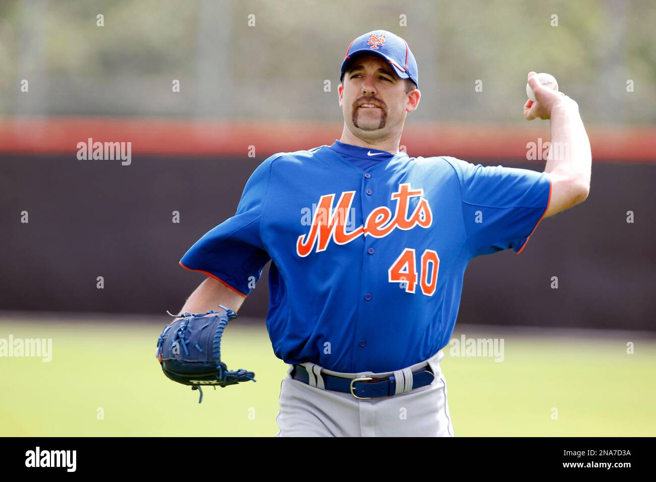 New York Mets relief pitcher Tim Byrdak throws during a spring training baseball workout