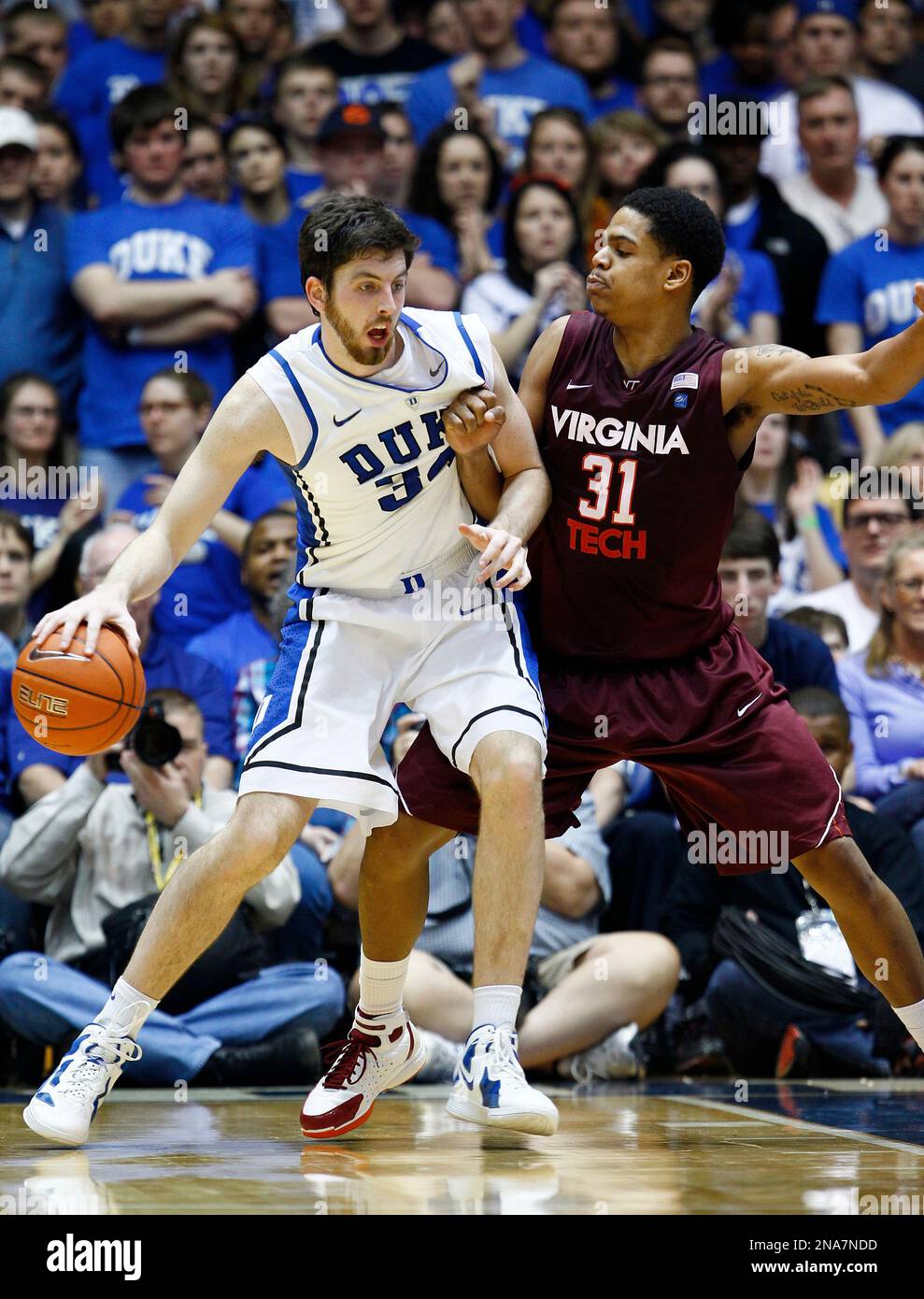 Duke's Ryan Kelly and Virginia Tech's Jarell Eddie (31) battle during