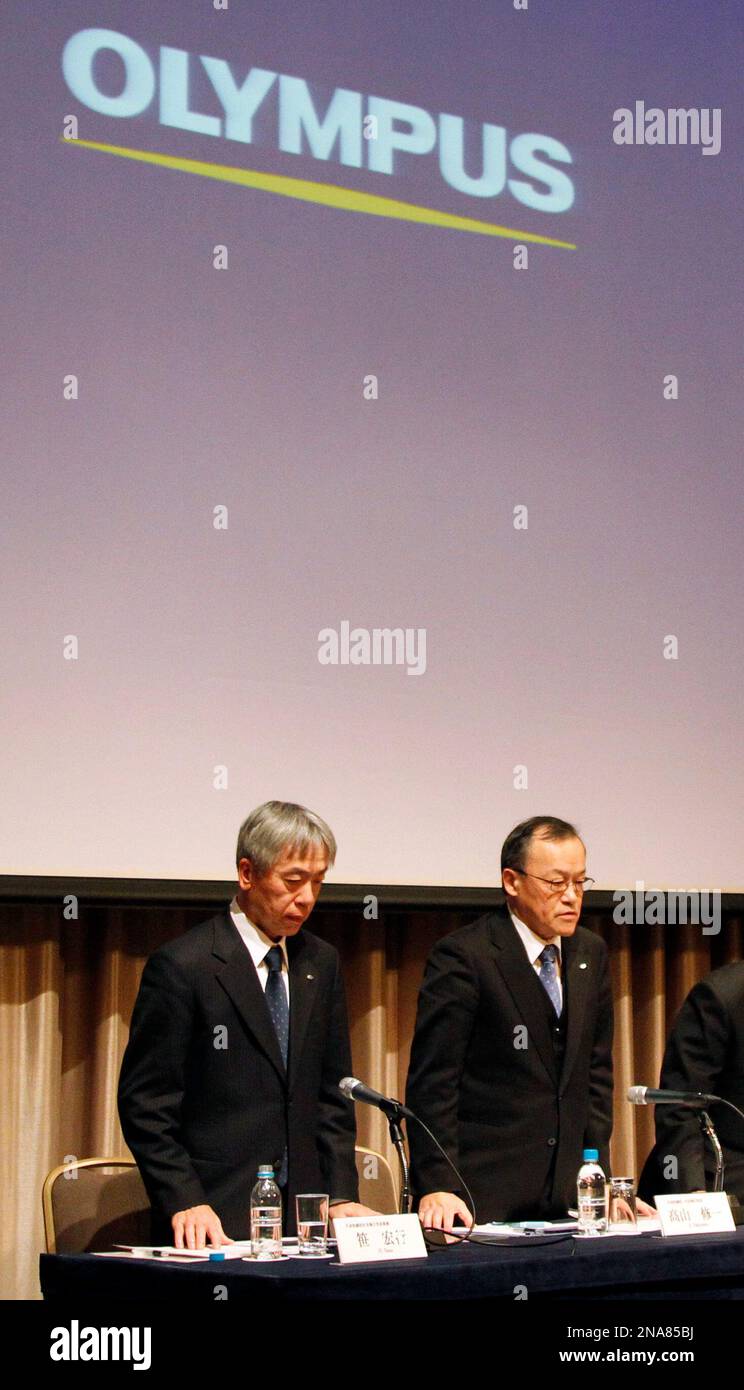 Nearly-named President of Olympus Corp. Hiroyuki Sasa, left, and his ...