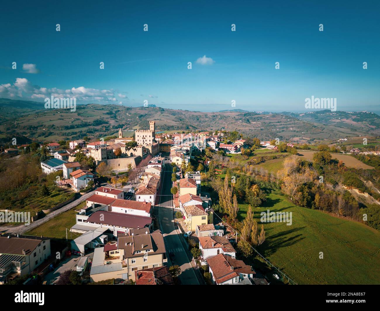 An aerial shot of the beautiful buildings of the medieval Tavoleto village in Italy on a sunny day Stock Photo