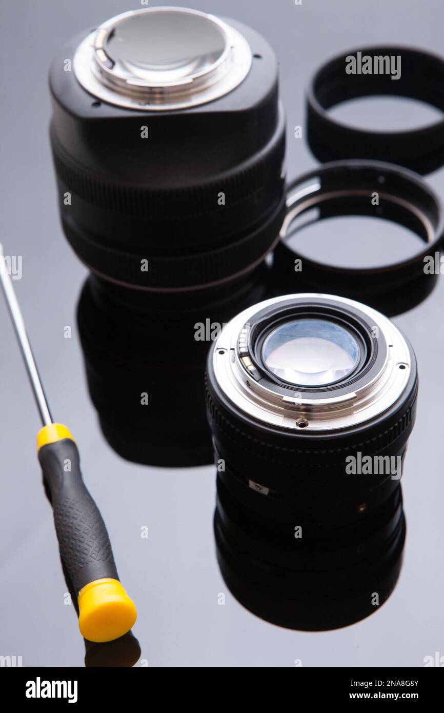 Precision optic photo lens service, adjust, align Stock Photo Alamy