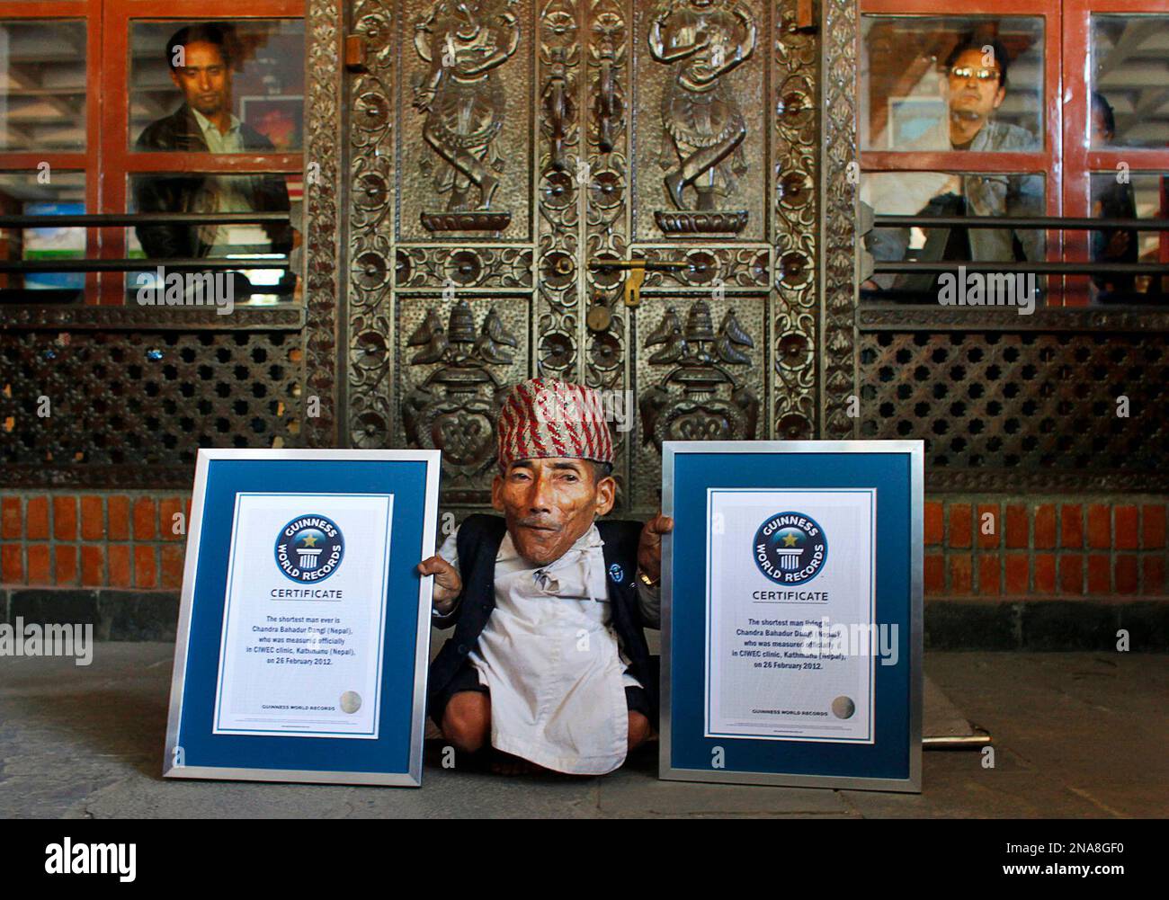 nepal-s-chandra-bahadur-dangi-poses-with-his-certificates-after-being