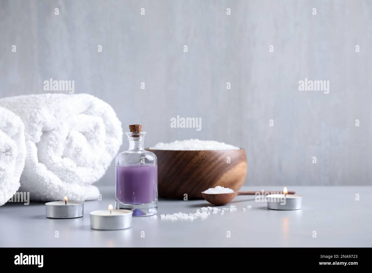 Composition with different spa items on grey table, space for text Stock Photo