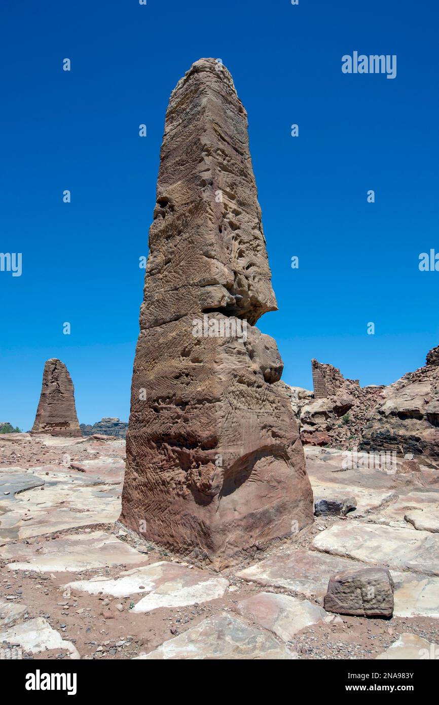 The two obelisks marking the entrance to the High Place of Sacrifice at the ancient site of Petra in Jordan. Stock Photo