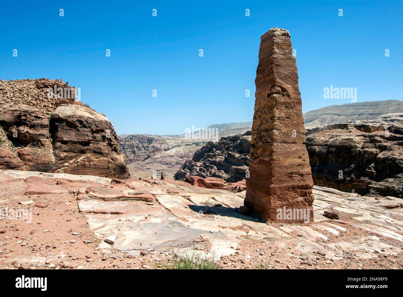 One of the two obelisks marking the entrance to the High Place of Sacrifice at the ancient site of Petra in Jordan. Stock Photo