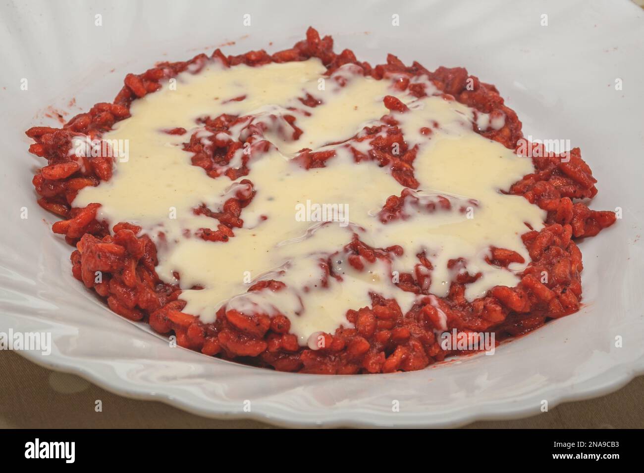 Risotto With Beetroot And Taleggio Cheese Stock Photo Alamy