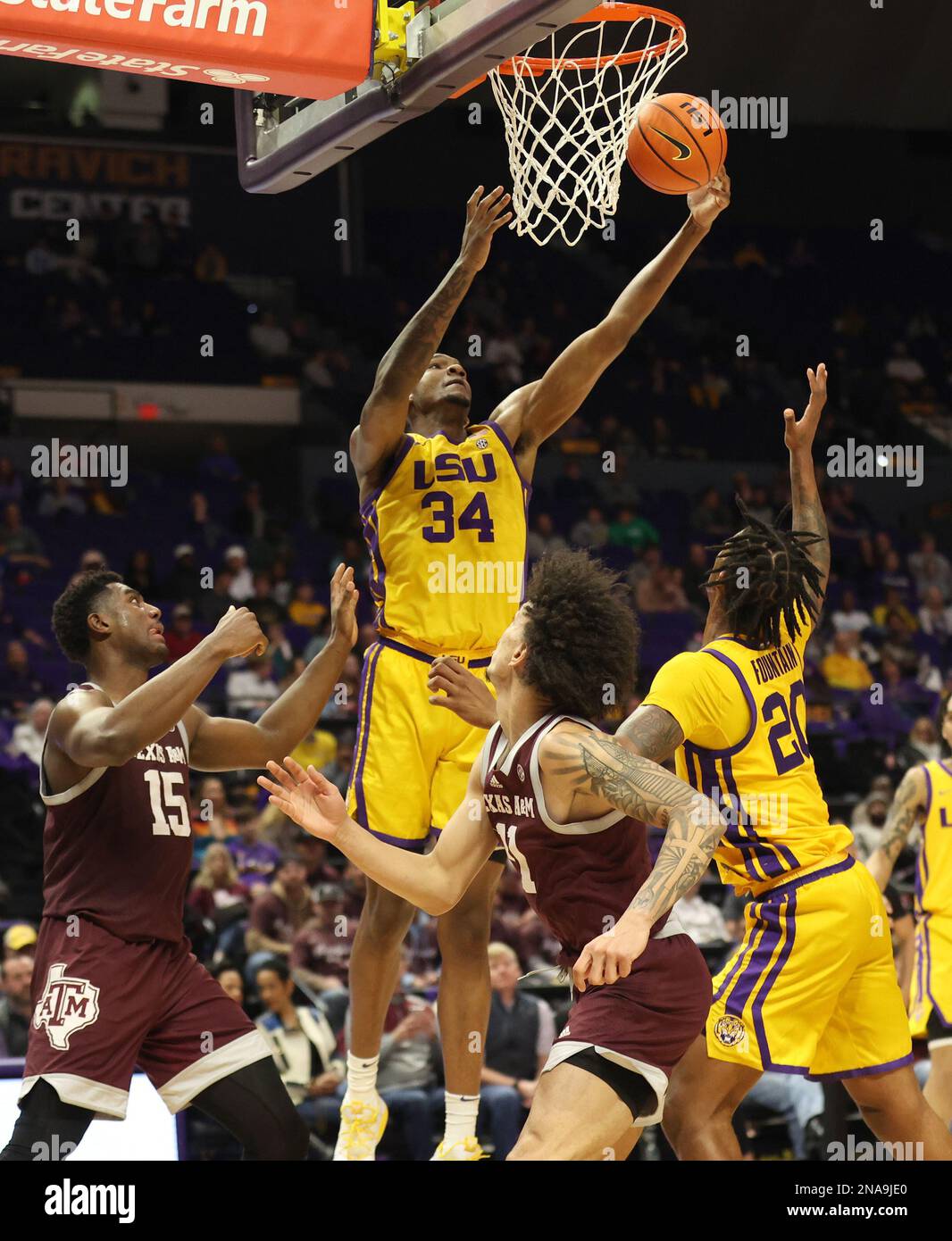 LSU Tigers forward Shawn Phillips Jr. (34) pulls down a rebound during