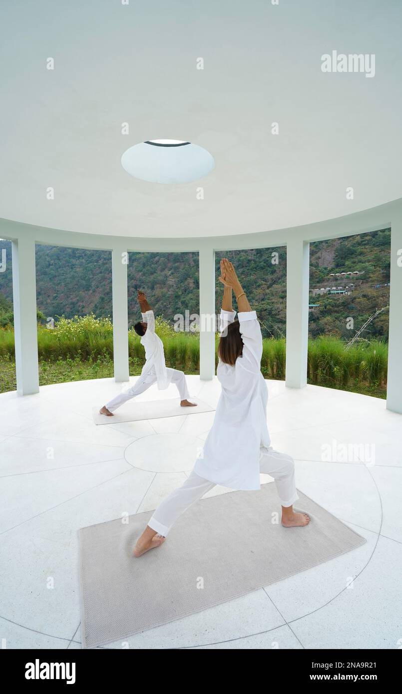 Yoga Class at Taj Risikesh Hotel in the Foothills of the Himalayas between Rishikesh and Devprayag in the Ganges Valley, Uttarakhand, India. Stock Photo