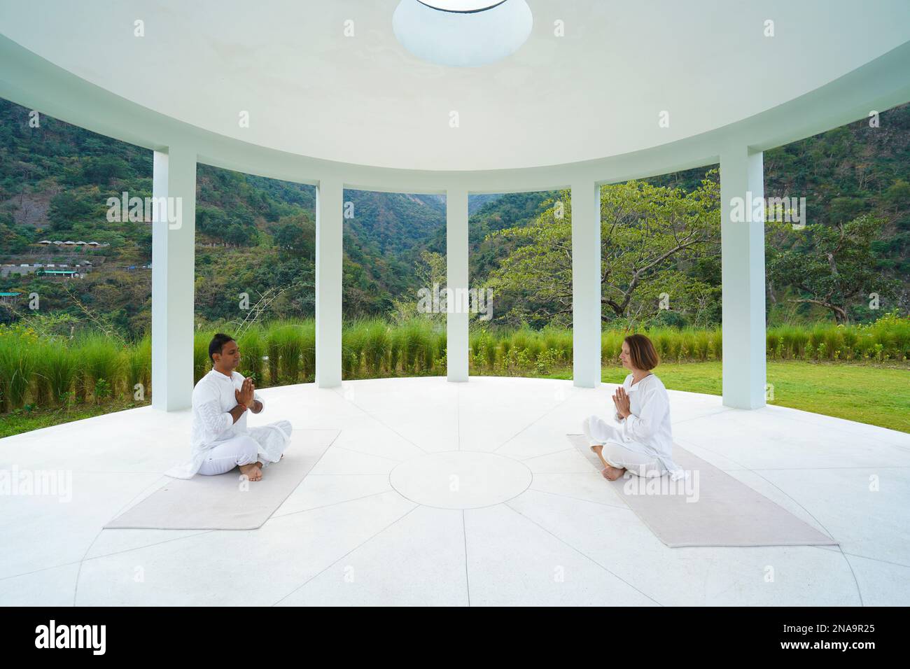 Yoga Class at Taj Risikesh Hotel in the Foothills of the Himalayas between Rishikesh and Devprayag in the Ganges Valley, Uttarakhand, India. Stock Photo