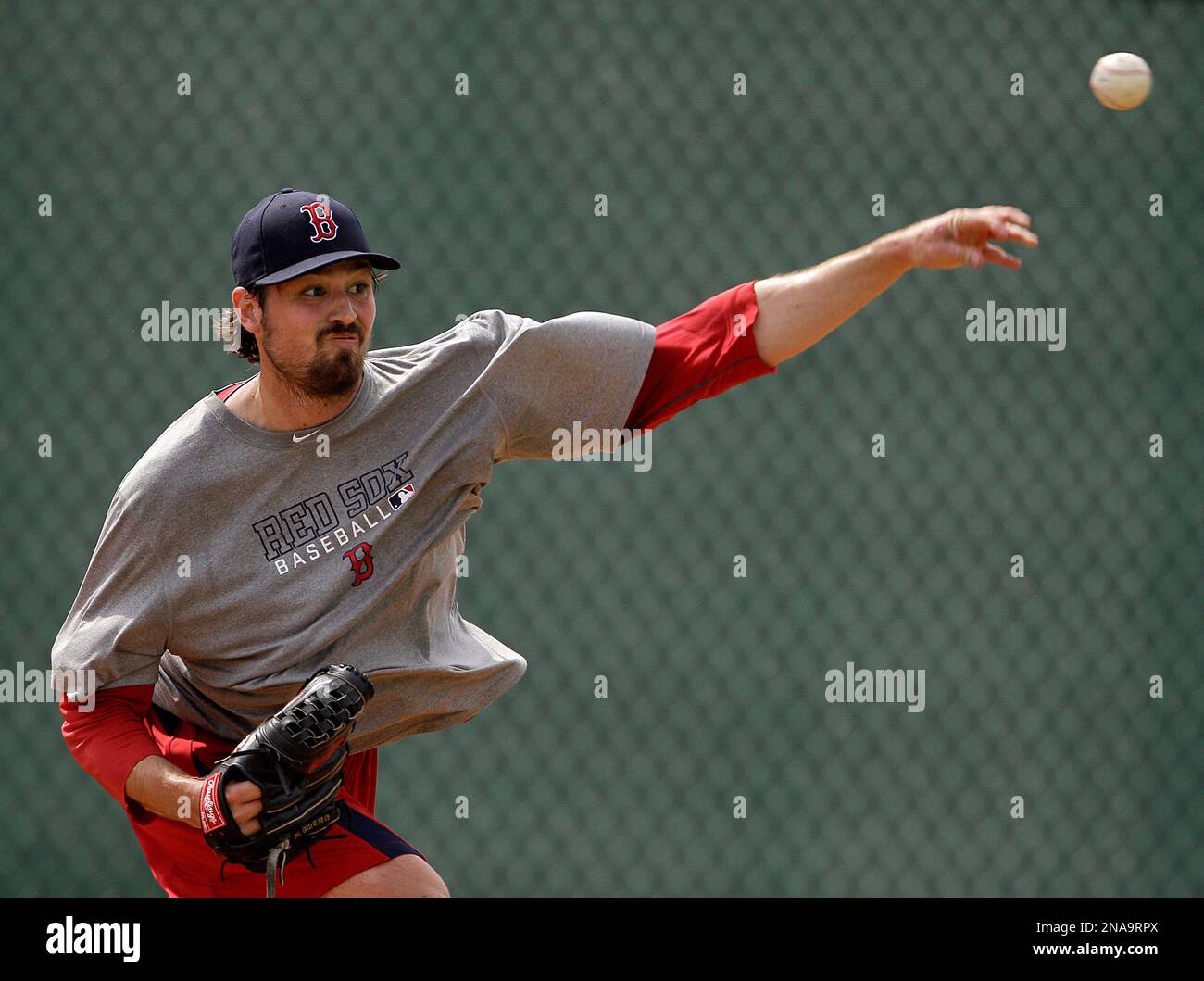 Boston Red Sox Andrew Miller throws as pitchers and catchers report to spring training baseball