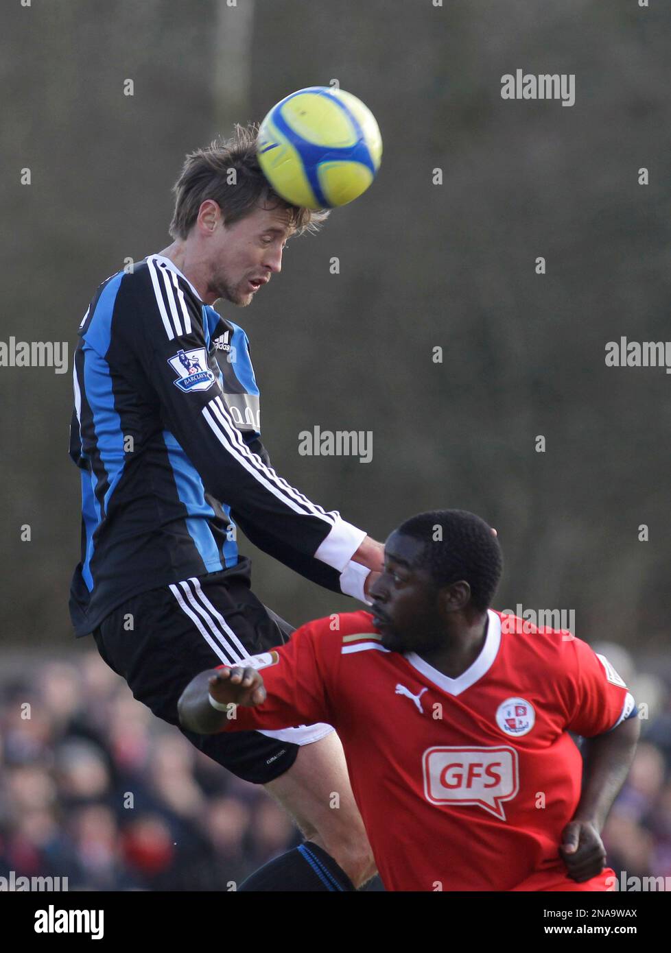 Stoke City's Peter Crouch, left, climbs above Crawley Town's Pablo