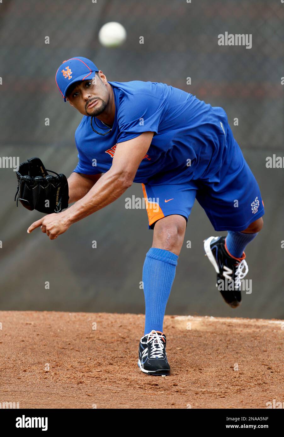 Pitcher Johan Santana wears his new cap and jersey during a news News  Photo - Getty Images