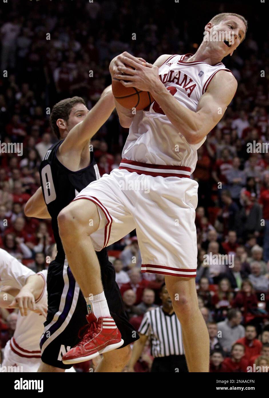 Indiana forward Cody Zeller, right, grabs a rebound over Northwestern