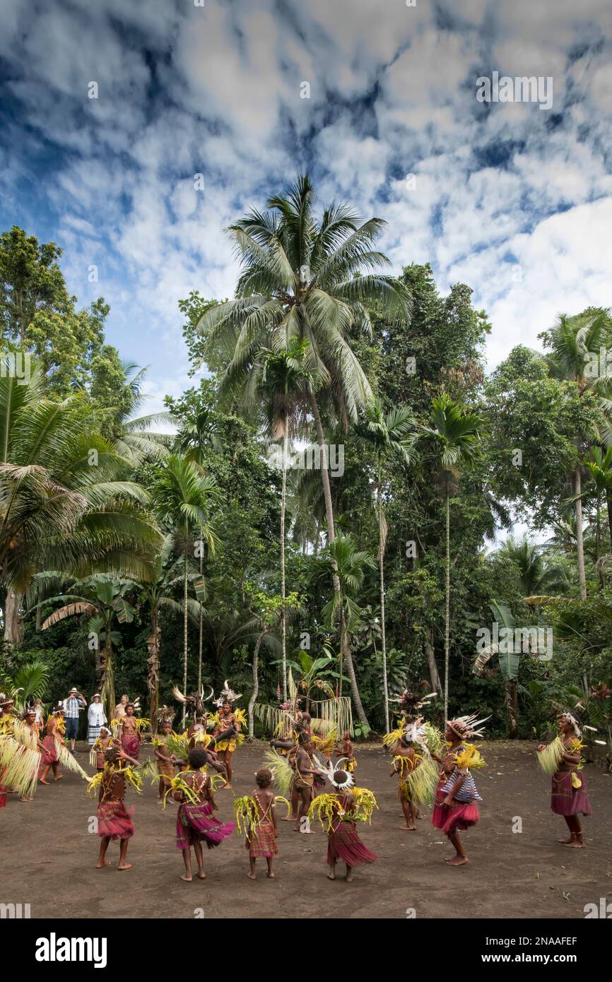 Villagers performing traditional sing sing Melanesian tribal dance in Madang, Papua New Guinea Stock Photo