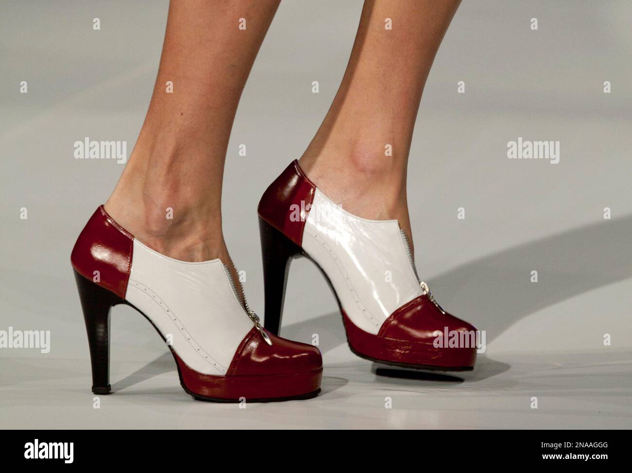 A model displays shoes by Colombian designer Maria Claudia Arboleda during  the International Fashion Week in Bogota, Colombia, Tuesday, Feb. 14, 2012.  (AP Photo/Fernando Vergara Stock Photo - Alamy