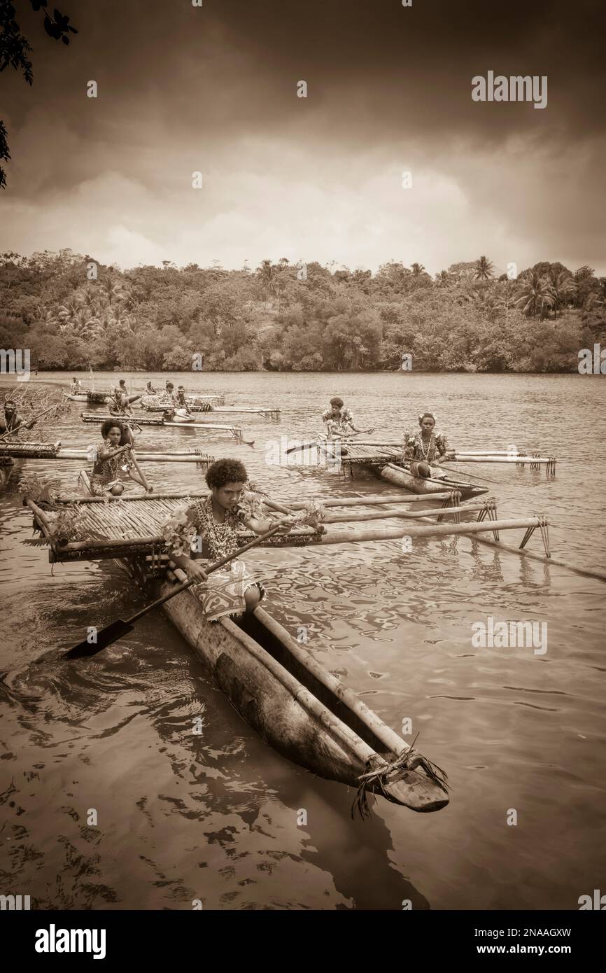 Melanesian woman in traditional dress with tapa bark cloth dress of Natade Village in outrigger
