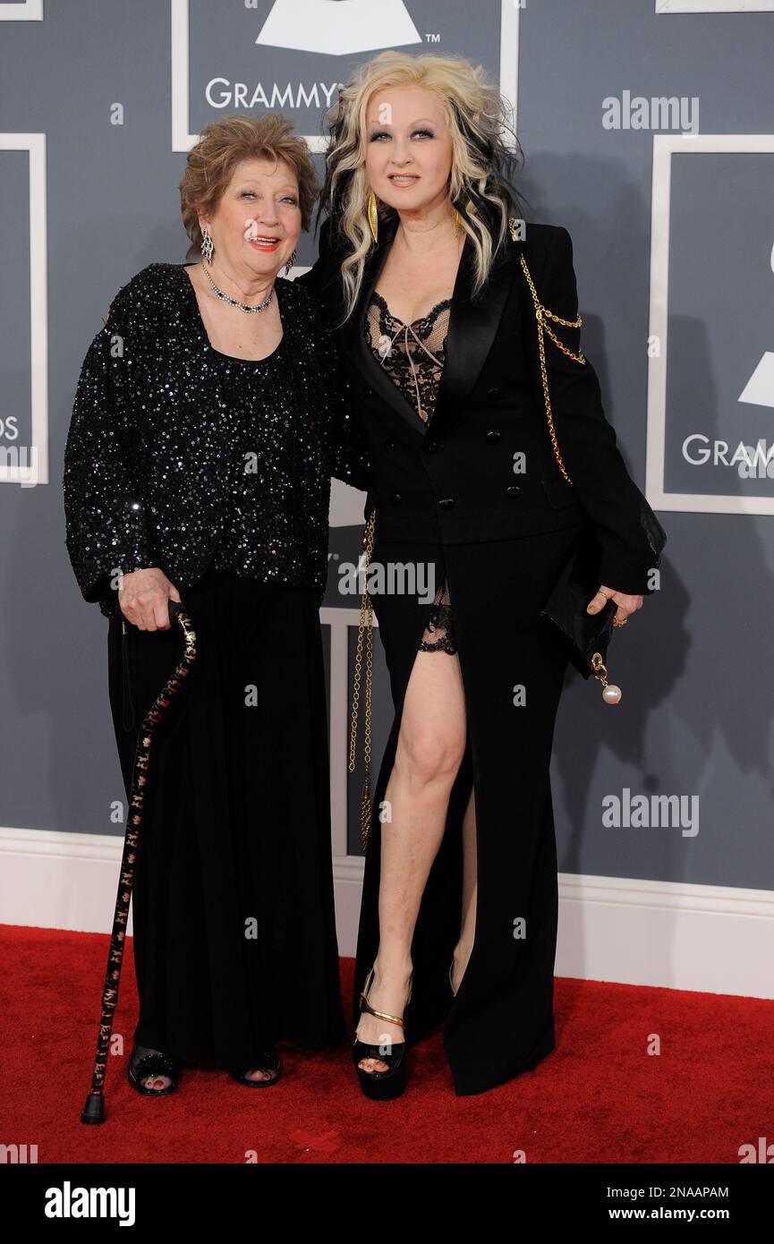 Cyndi Lauper, right, and Catrine Dominique arrive on the red carpet at
