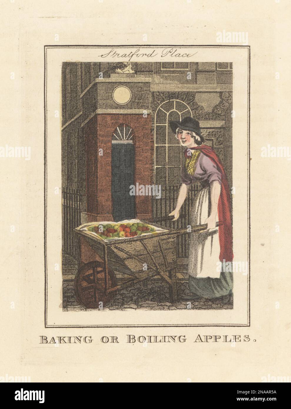 Woman apple seller in Stratford Place, London. Woman in bonnet, cloak, apron and skirts, with wheelbarrow full of apples, sold hot in winter. Baking or boiling apples! Handcoloured copperplate engraving by Edward Edwards after an illustration by William Marshall Craig from Description of the Plates Representing the Itinerant Traders of London, Richard Phillips, No. 71 St Paul’s Churchyard, London, 1805. Stock Photo