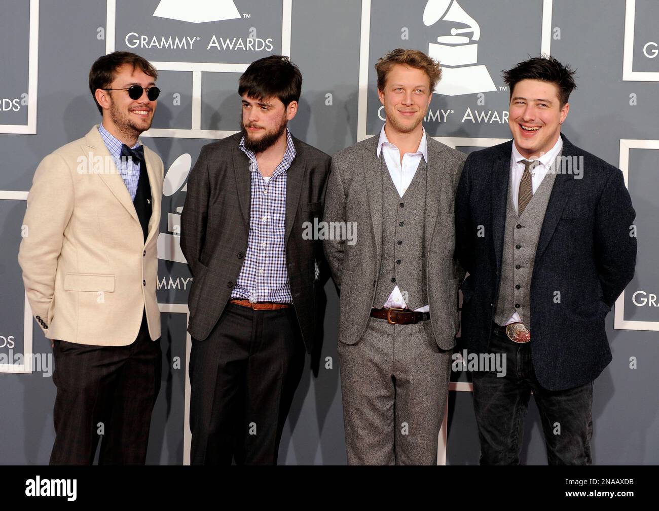 The band Mumford &amp; Sons arrives at the 54th annual GRAMMY Awards on ...
