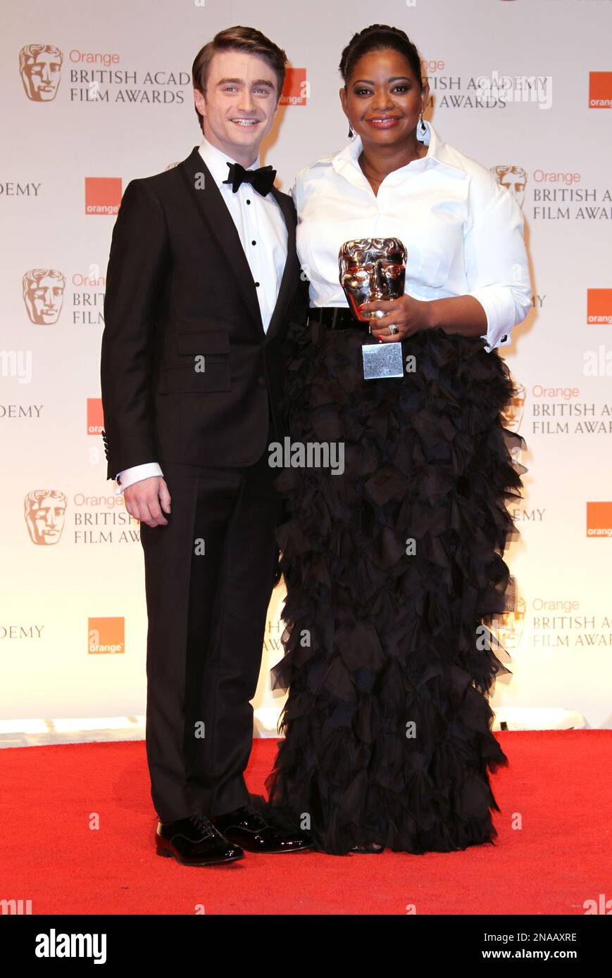 From left actor Daniel Radcliffe and atress Octavia Spencer posing with ...