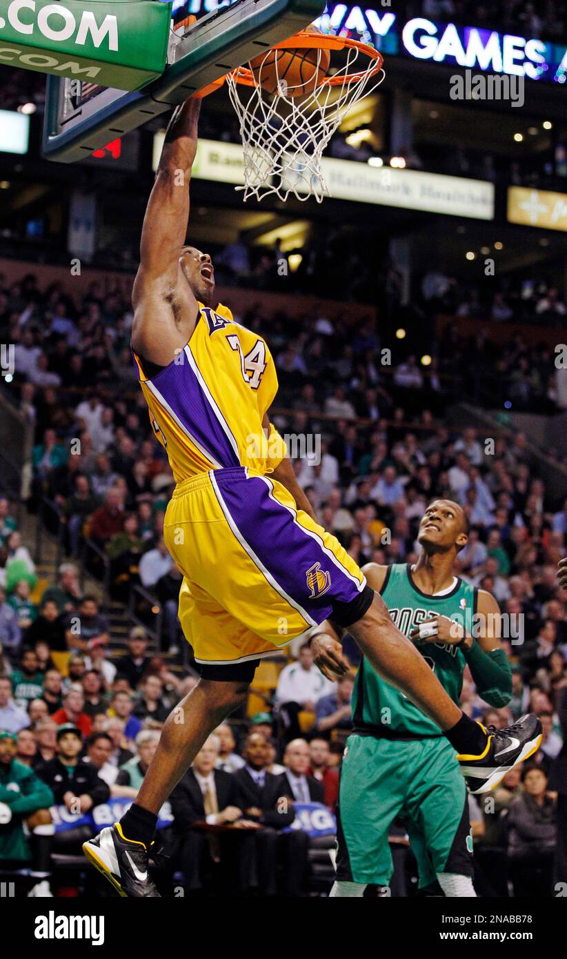 Kobe Rondo Point Los Angeles Lakers shooting guard Kobe Bryant (24) dunks against Boston ...