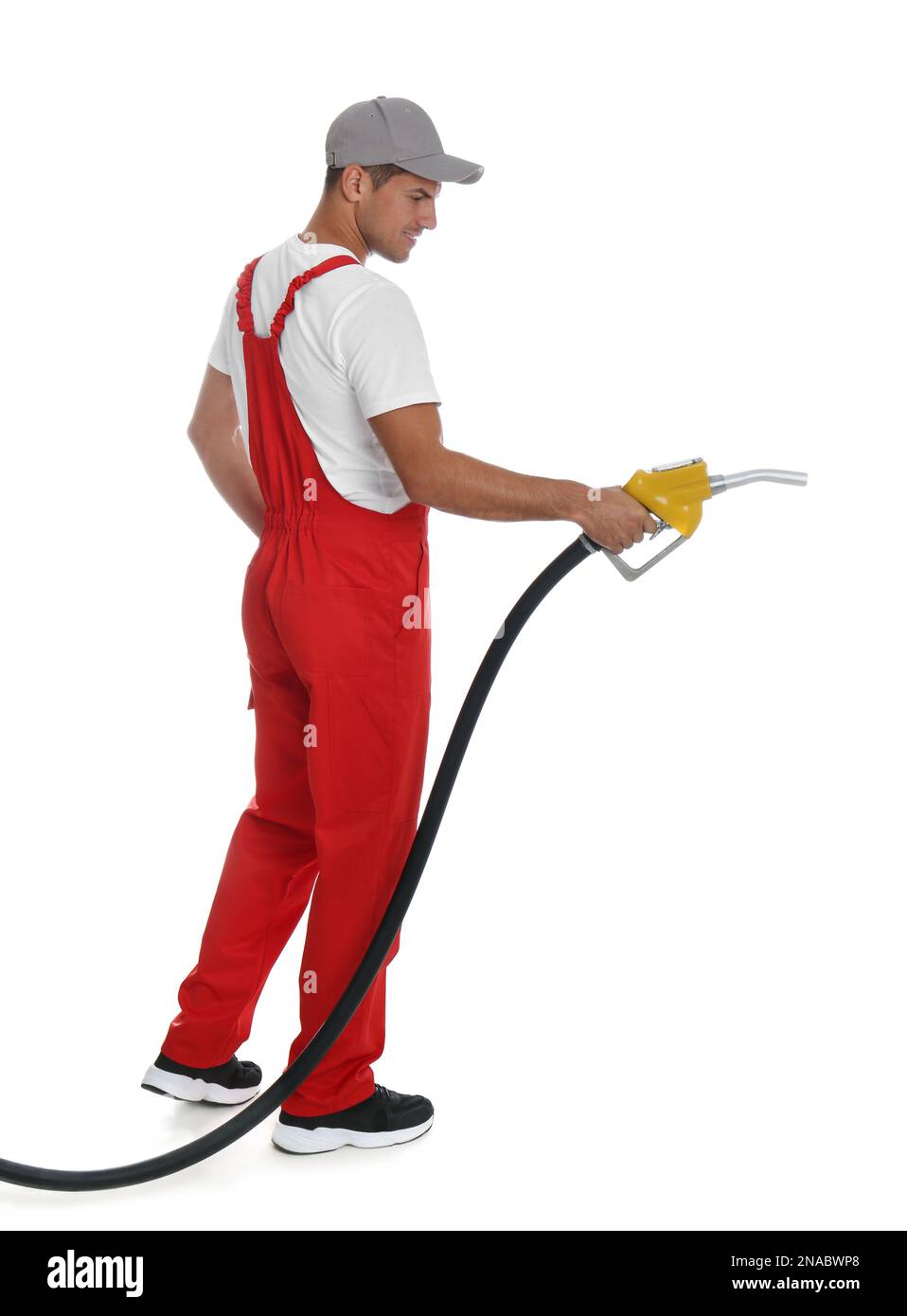 Gas station worker with fuel nozzle on white background Stock Photo Alamy