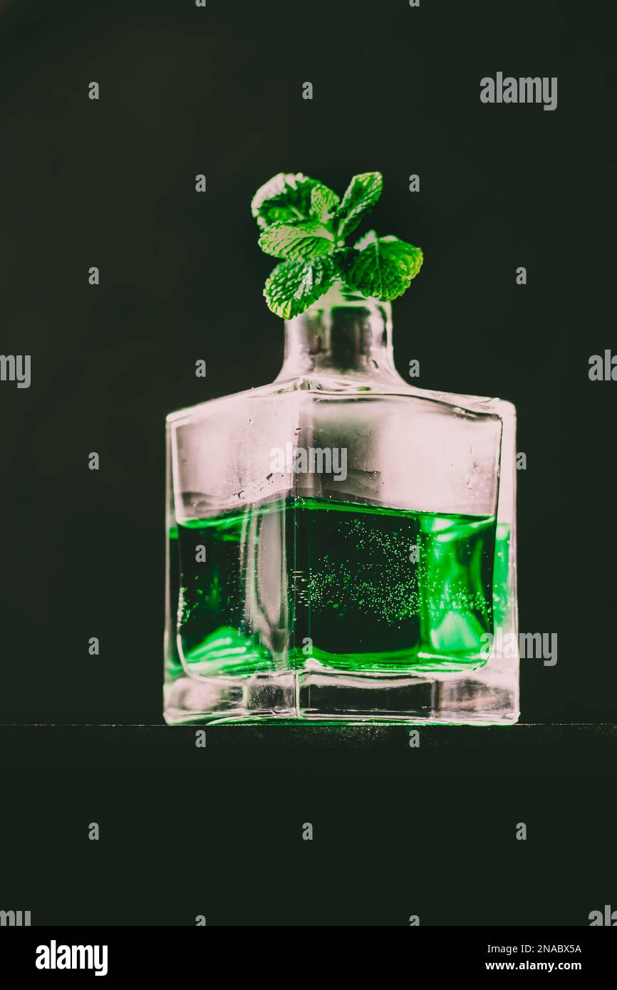 Stylized bottle of absinthe. Background, mockup. Stock Photo