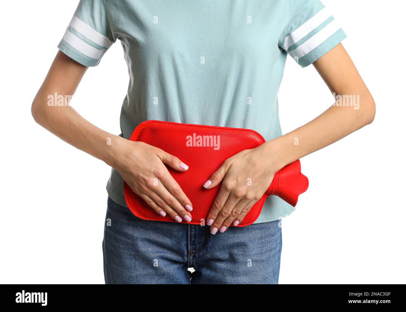 Woman using hot water bottle to relieve menstrual pain on white