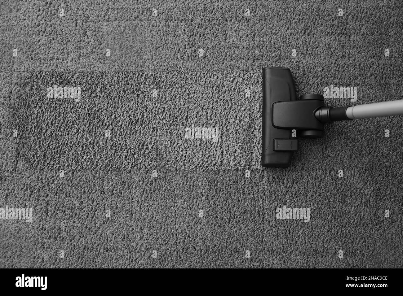 Housekeeping vacuum cleaner Black and White Stock Photos & Images - Alamy