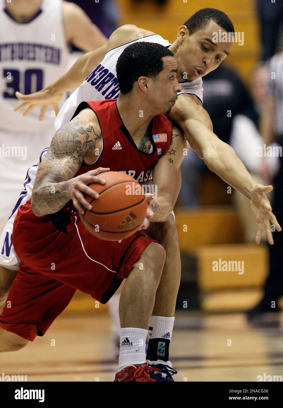 Nebraska guard Bo Spencer (23) drives against Northwestern guard Reggie
