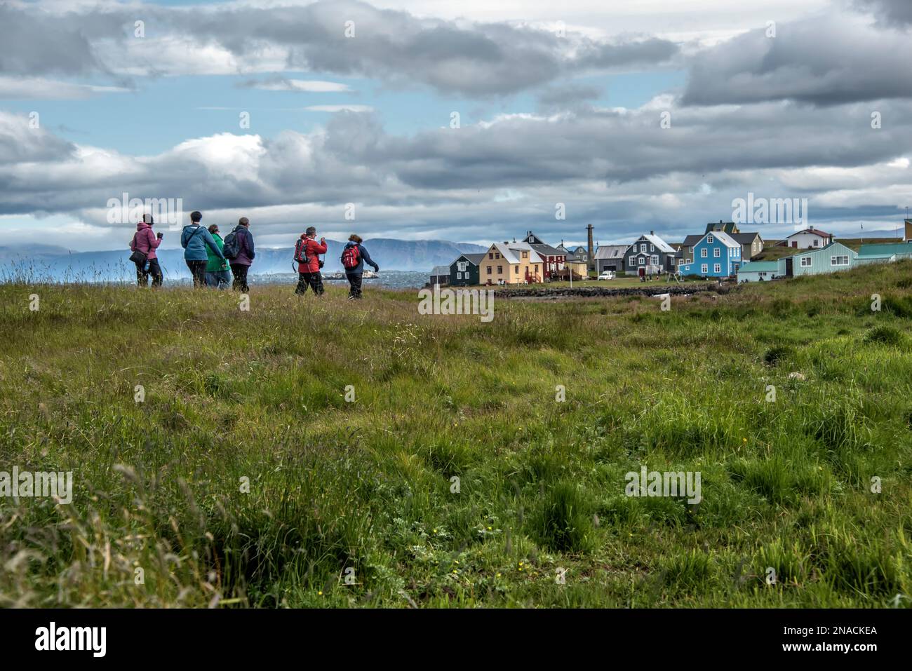 Visitors to the town of Flatey, Iceland, a former fishing village that is now a tourist destination. Stock Photo