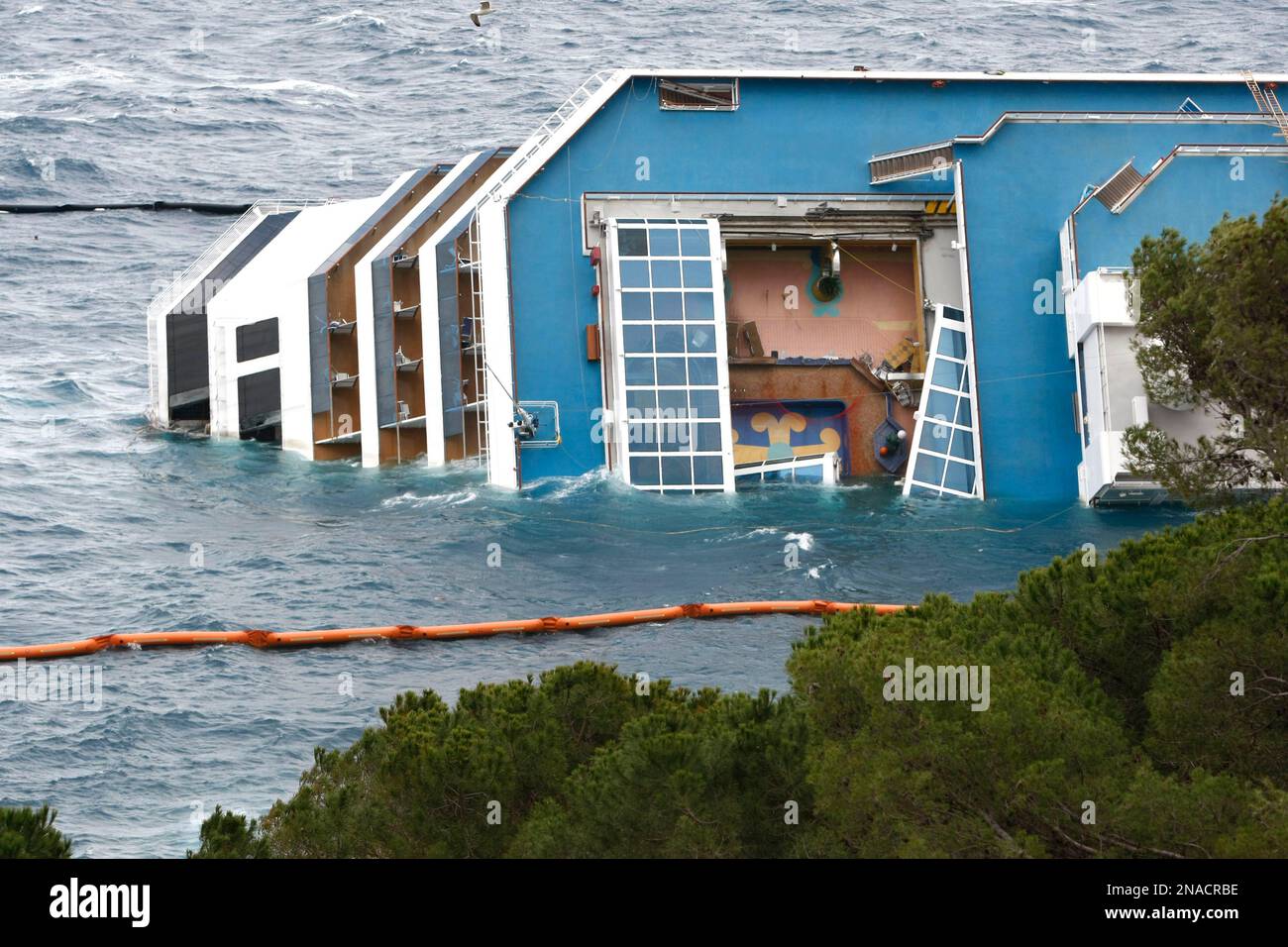 A view of one of the collapsed skylights of the grounded cruise ship Costa  Concordia off the Tuscan island of Giglio, Italy, Wednesday, Feb. 1, 2012.  After a night of rough seas,