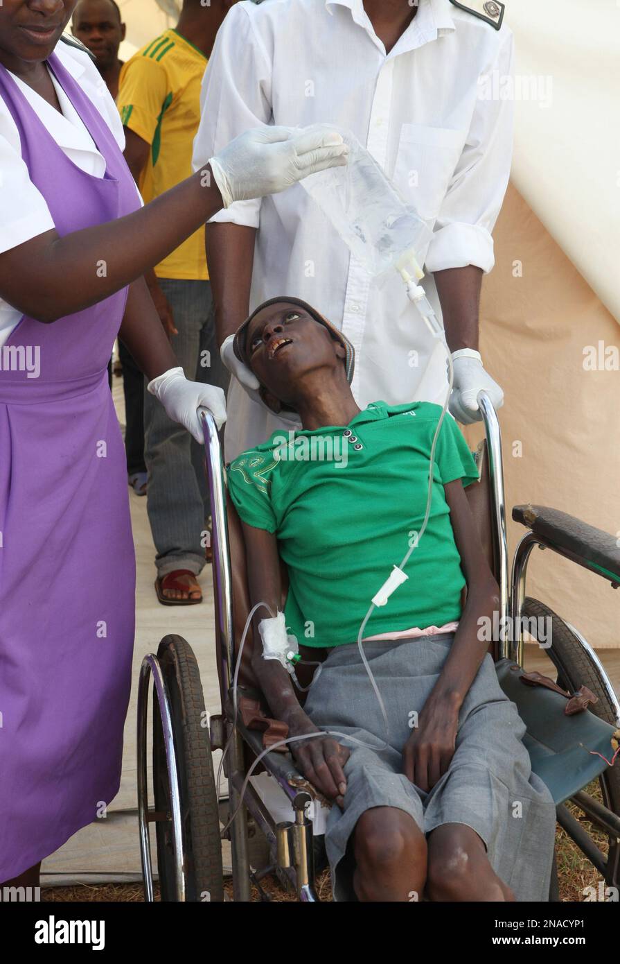 A patient suffering from HIV is taken to a local hospital in Harare ...