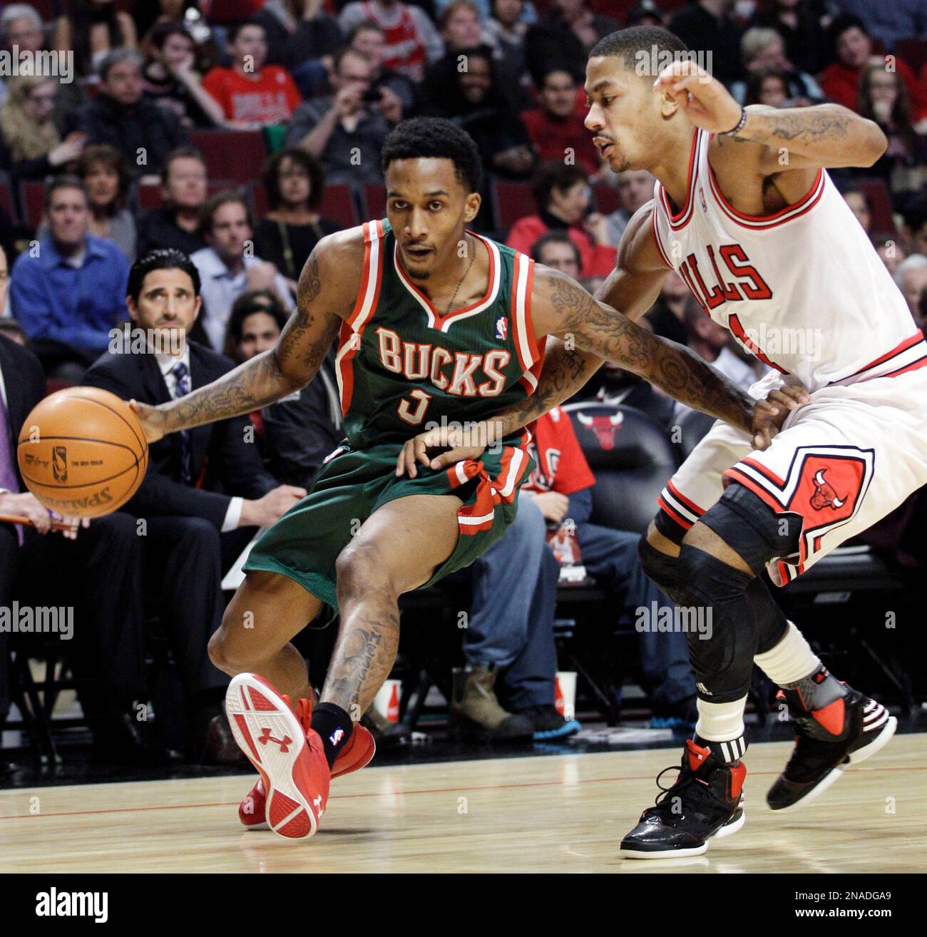 Milwaukee Bucks guard Brandon Jennings 3 drives to the basket as