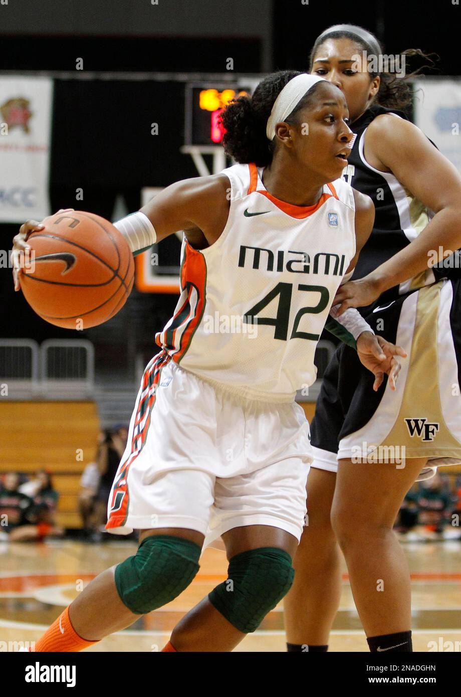 Miami's Shenise Johnson (42) prepares to shoot during the first half of