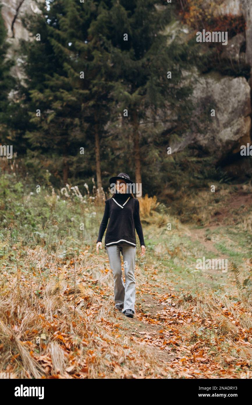 Woman walks through lush greenery hi-res stock photography and images ...