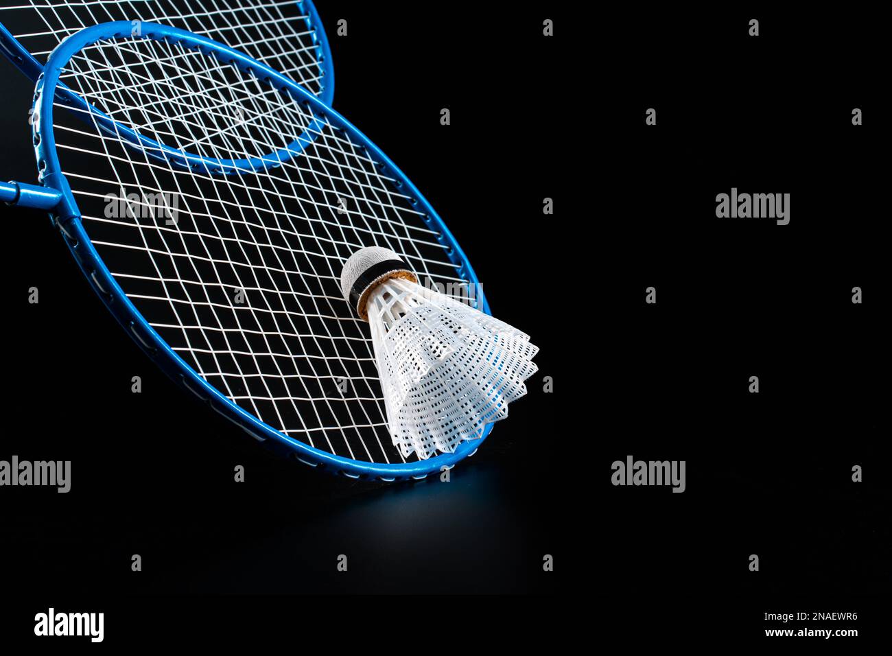 Badminton sport equipment on dark black background Stock Photo - Alamy