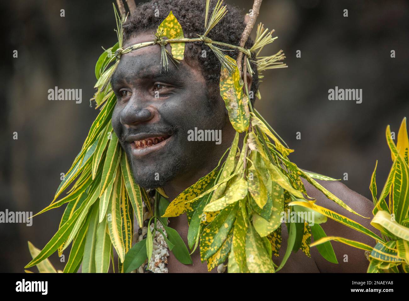 Man from the Jebo tribe, located in the Tufi area. The area is known for the tattooing of women, with each tribe having their own special design. Stock Photo