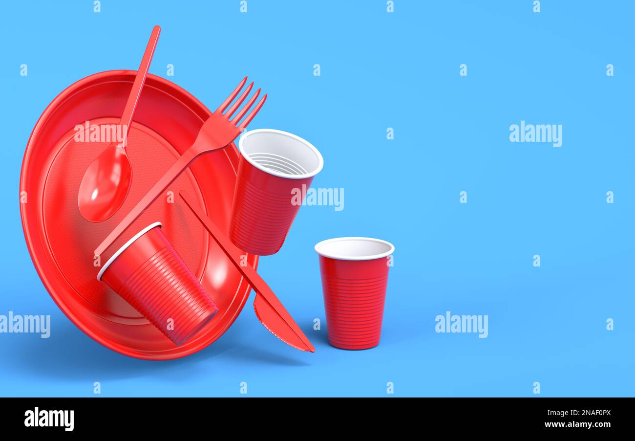 Set of disposable utensils like plate, folk, spoon,knife and cup on