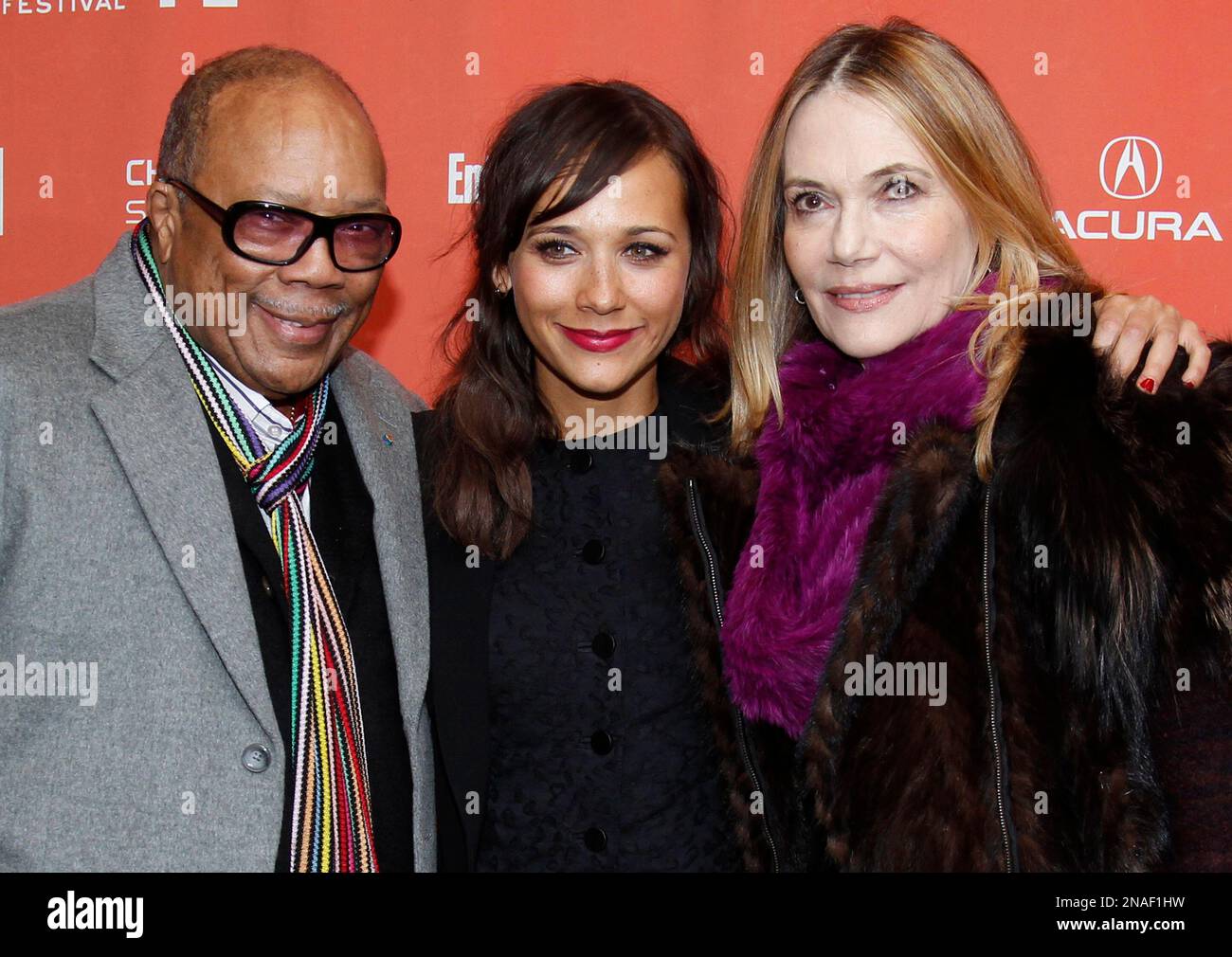 Actress Rashida Jones, left, poses with her father Quincy Jones, left