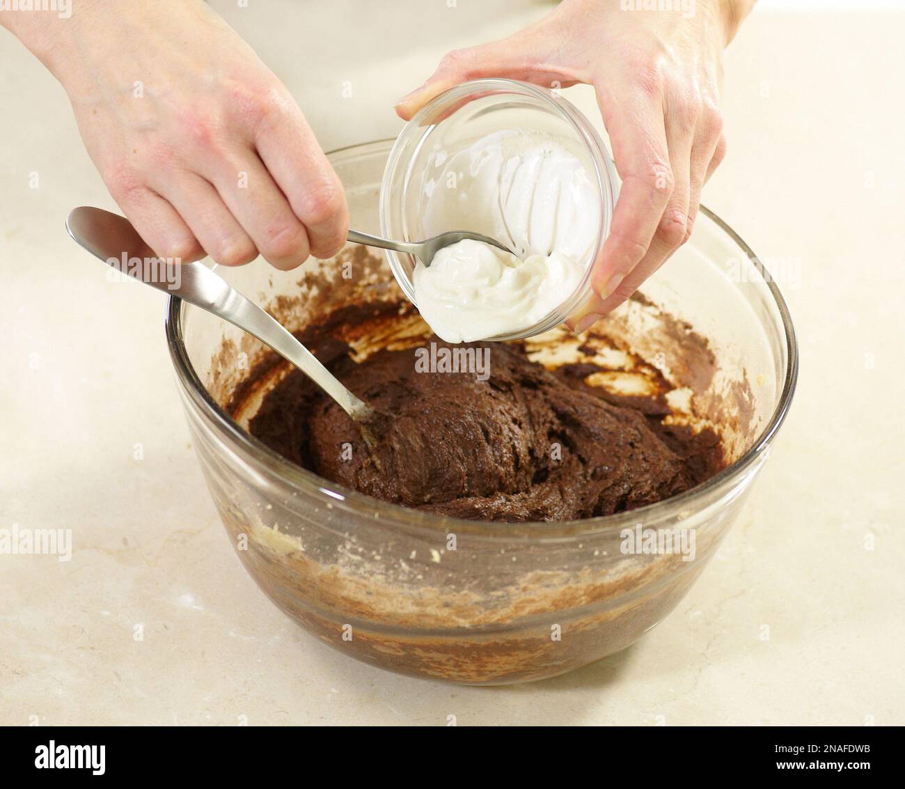 Making Whoopie Pies, adding yoghurt and mixing in with cake batter