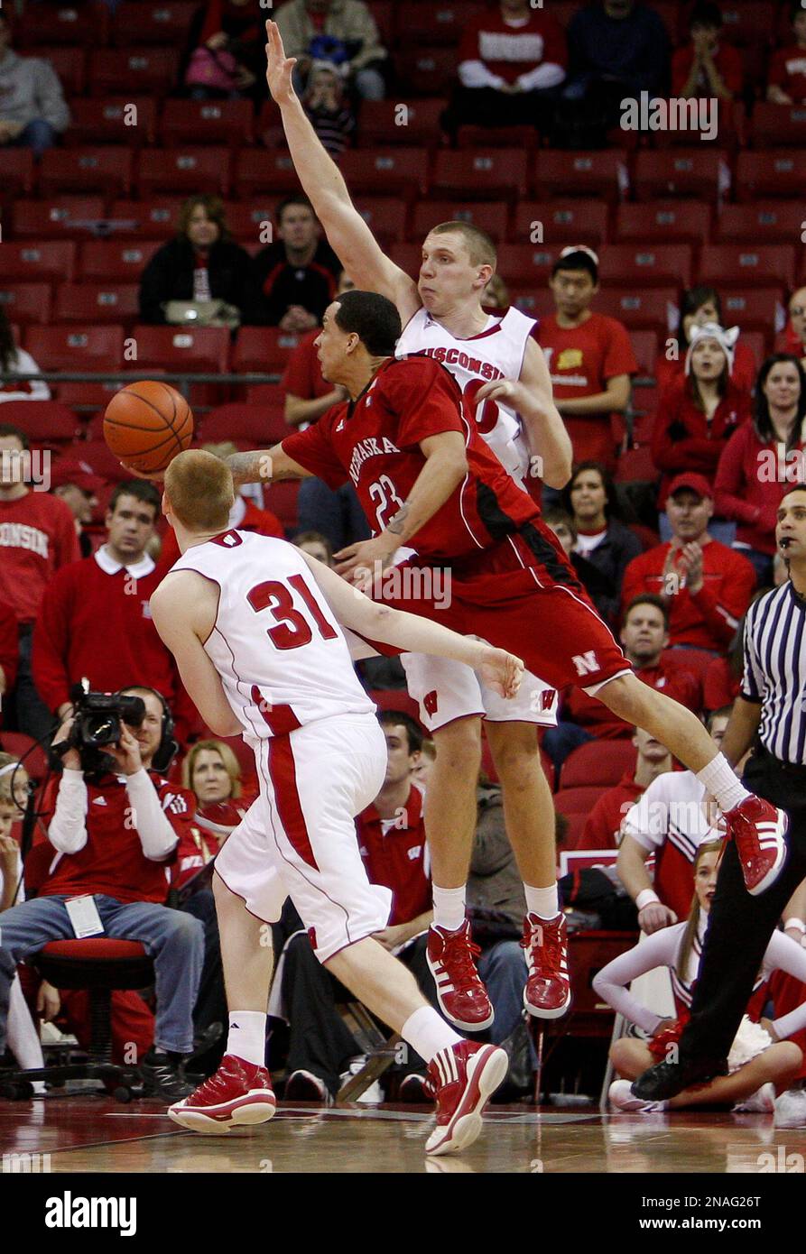 Nebraska's Bo Spencer (23) shoots between Wisconsin's Mike Bruesewitz