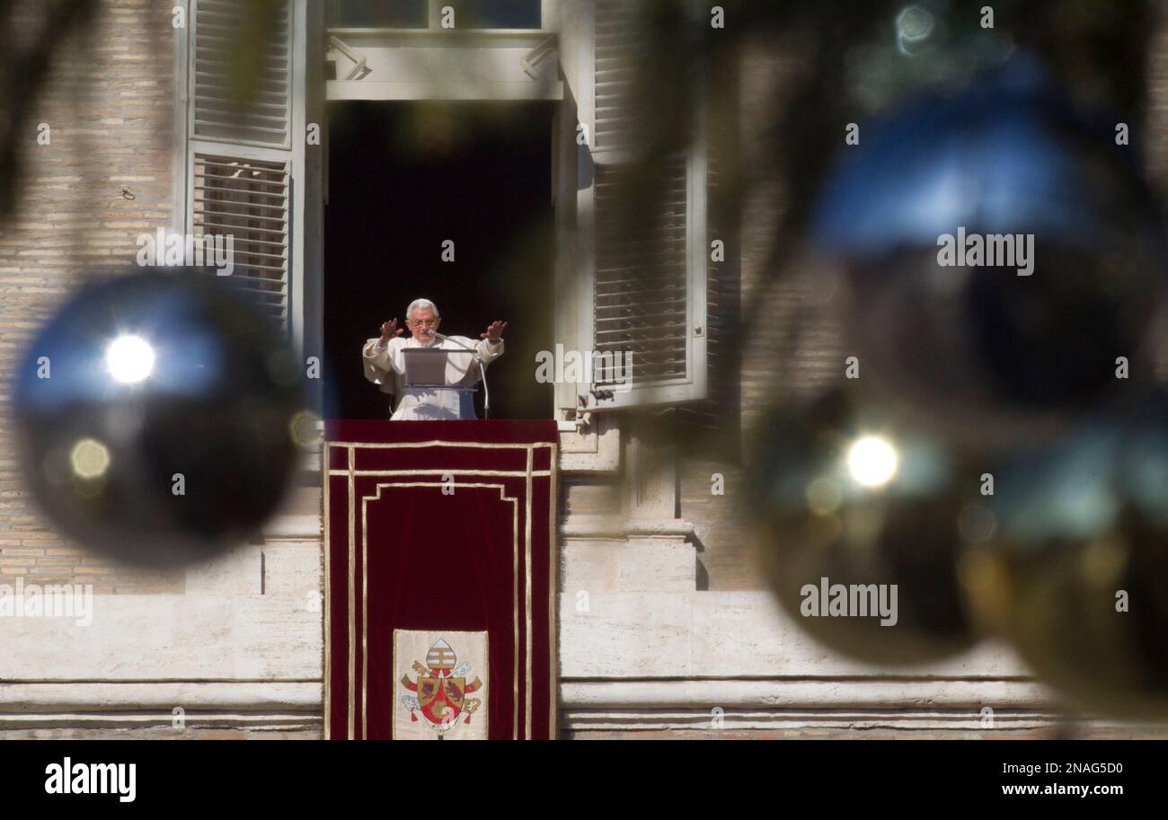 Pope Benedict XVI delivers his blessing during the Angelus noon prayer