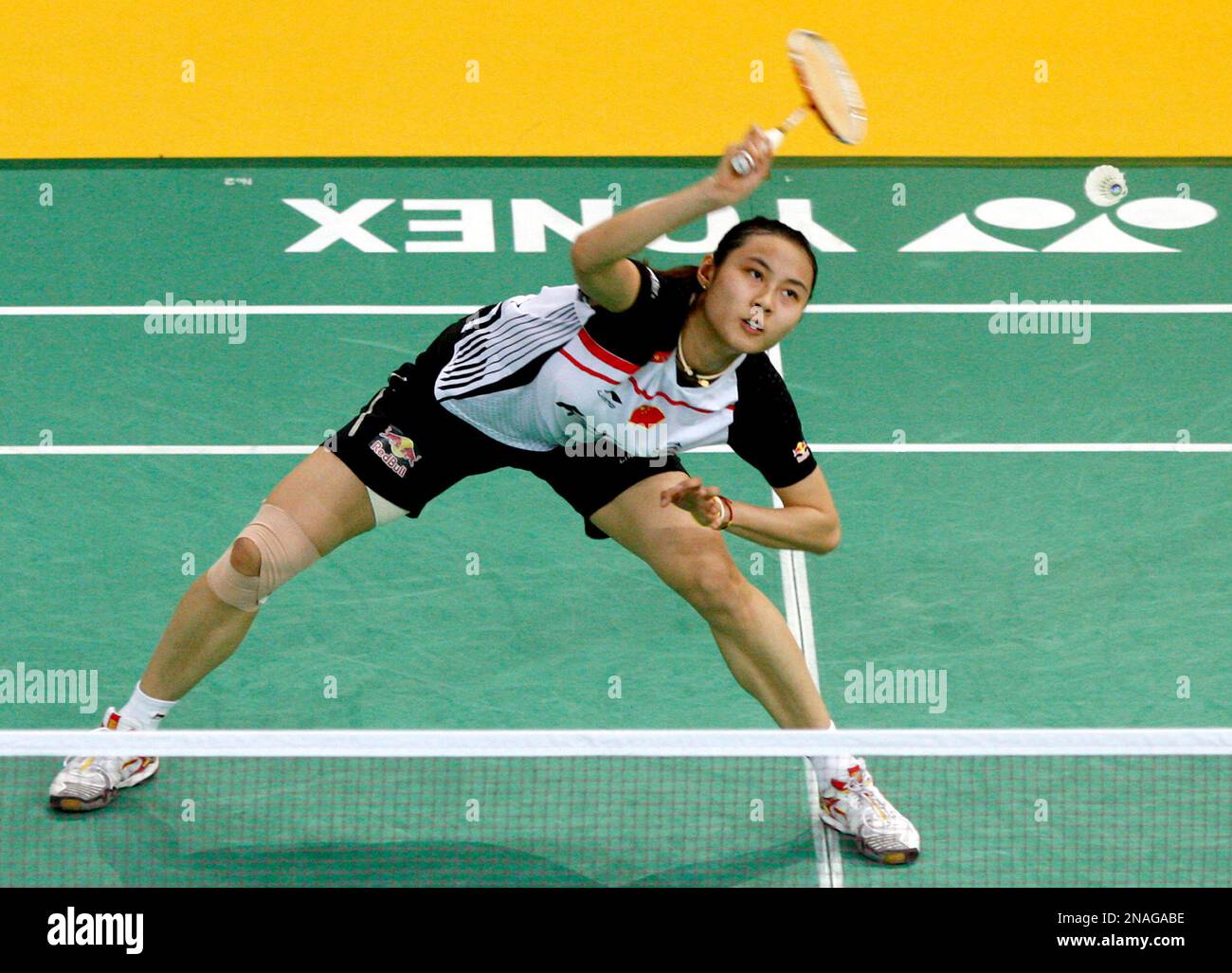 Chinas Wang Yihan returns a shot against Indias Saina Nehwal during their womens singles semifinal match of the Malaysia Open Badminton Superseries in Kuala Lumpur, Malaysia, Saturday, Jan