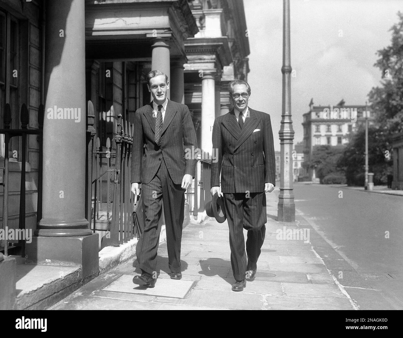 Captain Francis Baker, left, the 25 yearold, shown walking with his