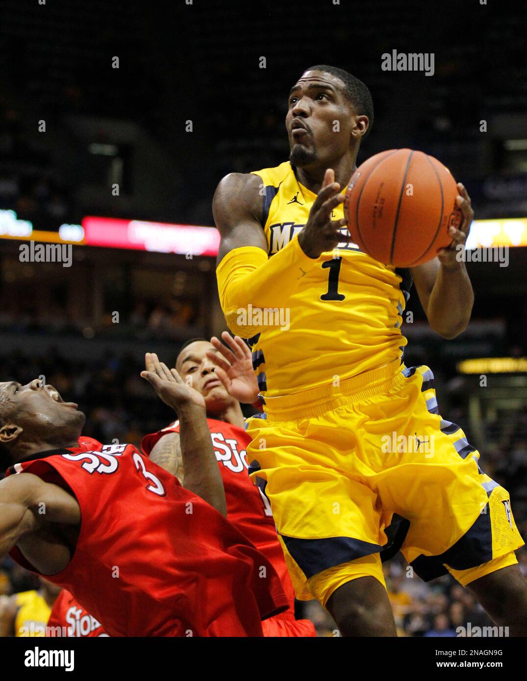 Marquette's Darius JohnsonOdom(1) drives to the basket against St