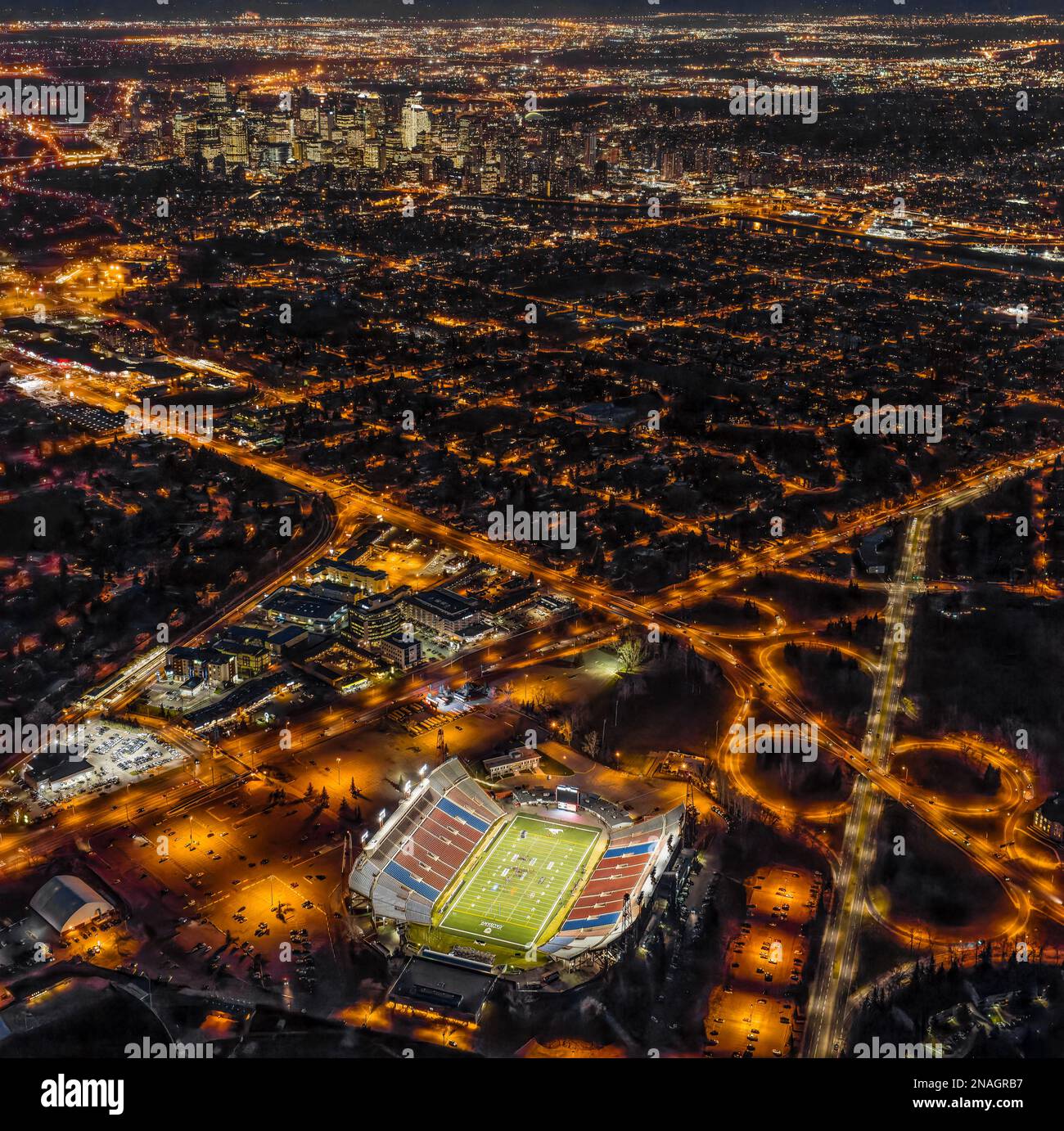 Aerial evening view of downtown Calgary, Alberta Canada and activity on