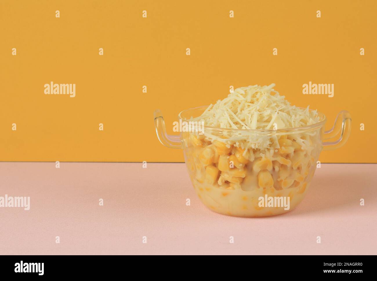 Creamy Corn with Shredded Cheese, Popular as Jagung Susu Keju or Jasuke. Steamed Corn with